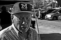 portrait of university of michigan alumni Irwin small after a loss to michigan state in football